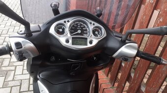 Yamaha X-city 125 i.e - 9