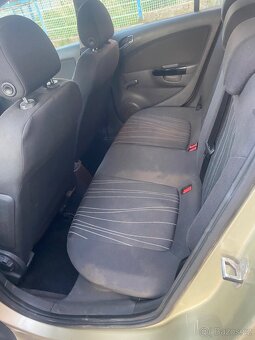 Opel Corsa 1.2i - 9