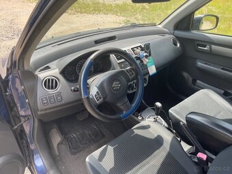 Suzuki Swift 1.3 i - 9