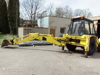 Traktor bagr JCB - 9