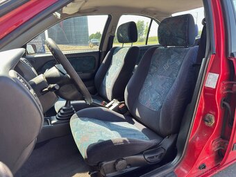 Nissan Almera 1.4 - 9