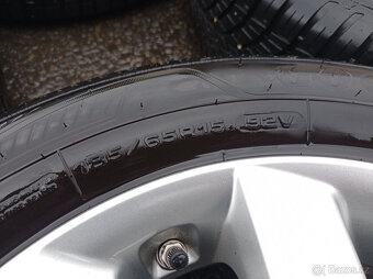 4x100 Kia Rio 5,5Jx15" ET36 č. 52910-1W650 alu disky - 9