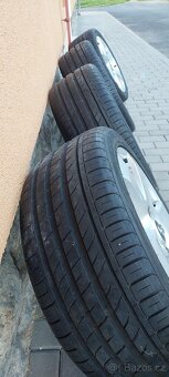 Prodám kompletní sadu ALU kol s letní pneu 245/40 R18 - 9