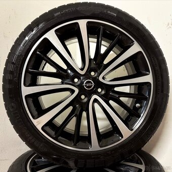 OPEL CORSA/ADAM 4x100 R17 ET44+LETNÍ 215/45R17 6mm - 9