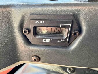 Kloubový nakladač CAT 908 - 9